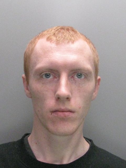 A police mugshot of Scott Sly