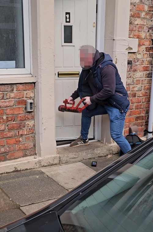 Officers execute a warrant at an address in Newcastle as part of Operation Impact.
