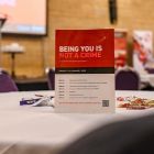 Picture of a hate crime leaflet on a table