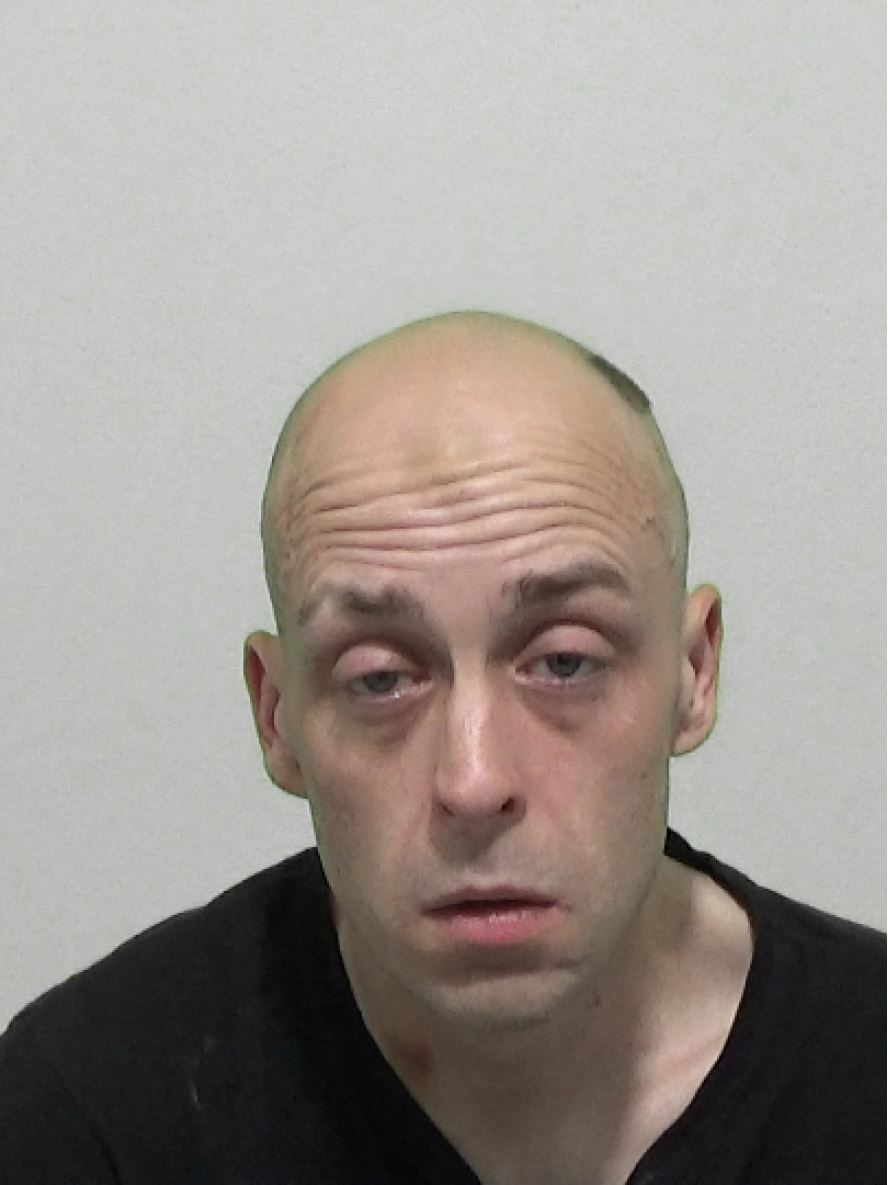 A mugshot of Lee McFarling